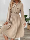 Perfee Pleated Tie Neck Long Sleeve Dress